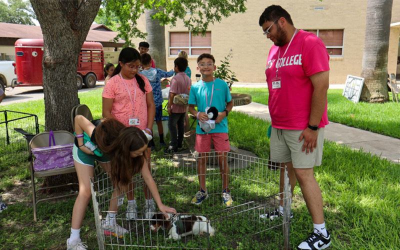 Kids' College attendees enjoy a petting zoo hosted by Makenna’s Legacy Therapy Farm.