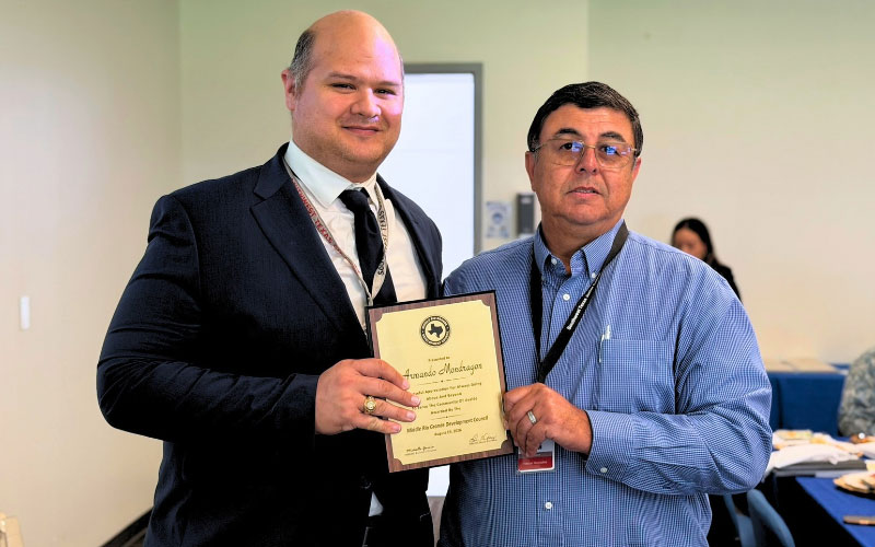SWTX President, Dr. Hector Gonzales is photographed with Dean of Applied Sciences, Armando Mondragon, following a recognition from the Middle Rio Grande Development Council.