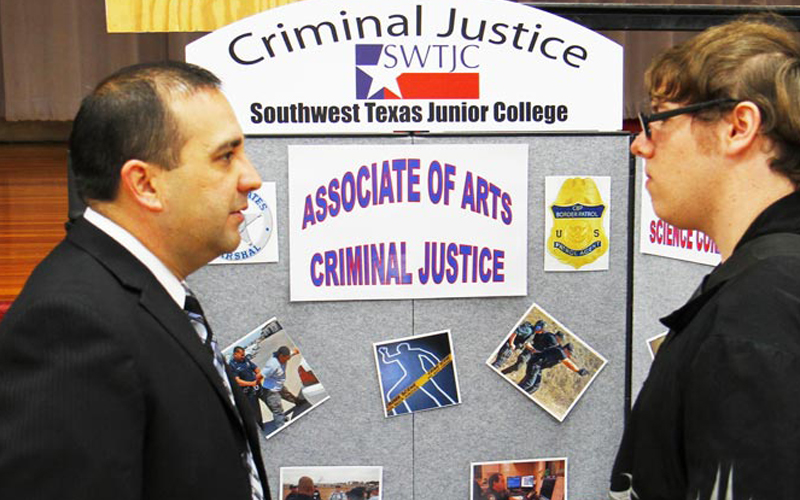 Man and woman discussing Associate of Arts Criminal Justice